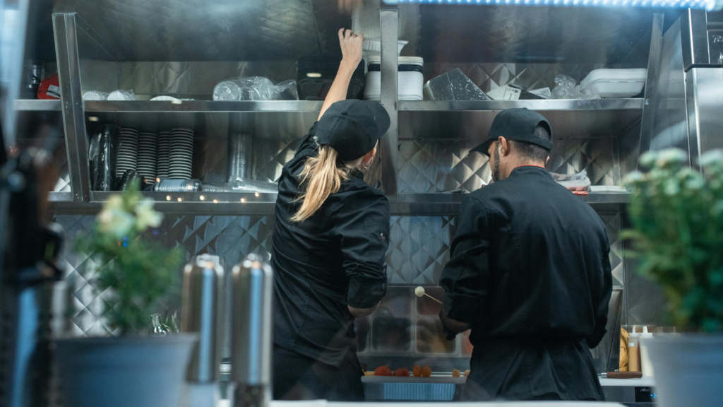 2 people working in the kitchen