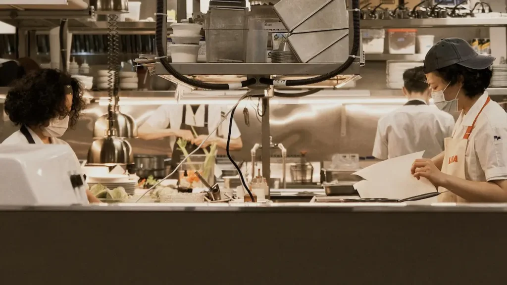 2 chefs working in a professional kitchen