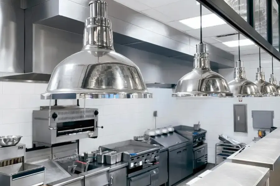 View of commercial kitchen equpments placed strategically.