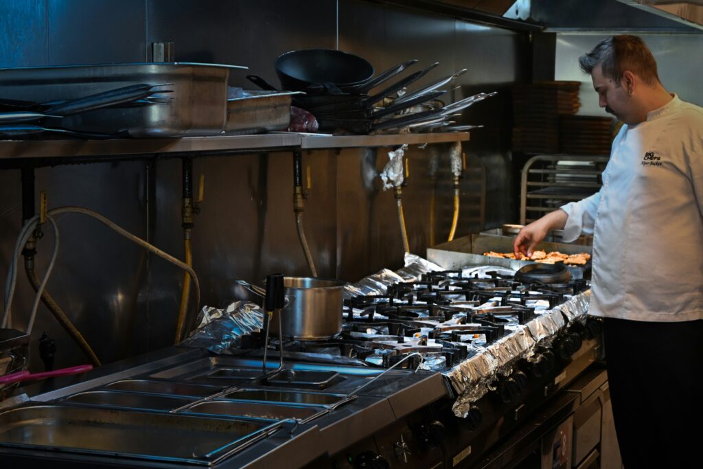Commercial kitchen station layout designed around menu workflow