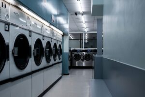 Modern hotel laundry facility showcasing efficient laundry design and planning to improve operational workflow, linen management, sustainability, and guest service quality.