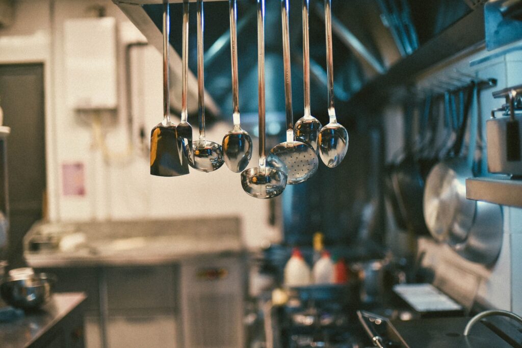 Commercial kitchen equipment selection guided by a food and beverage consultant
