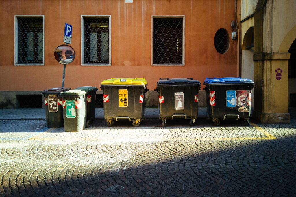 Segregated waste bins in hotel kitchen for compliance and cost control