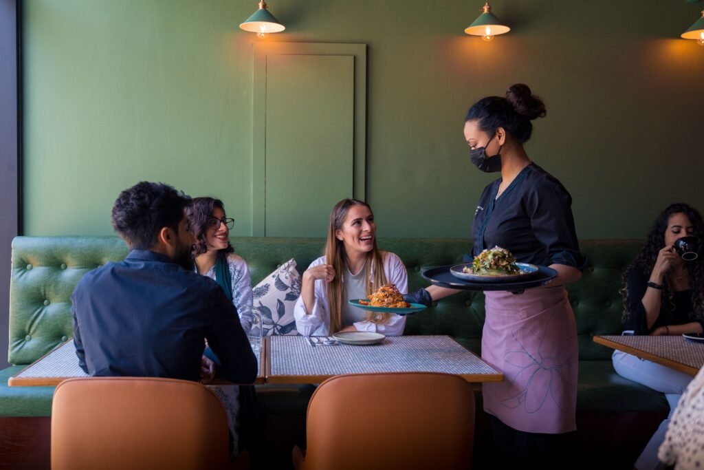 Hotel restaurant at full service cover, delivering the guest experience shaped by food and beverage consultant planning